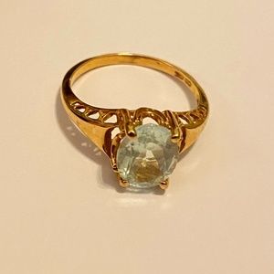 gold ring w/ aquamarine gem